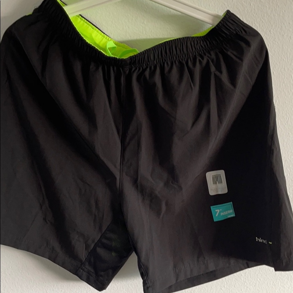 Black swim trunks with tag